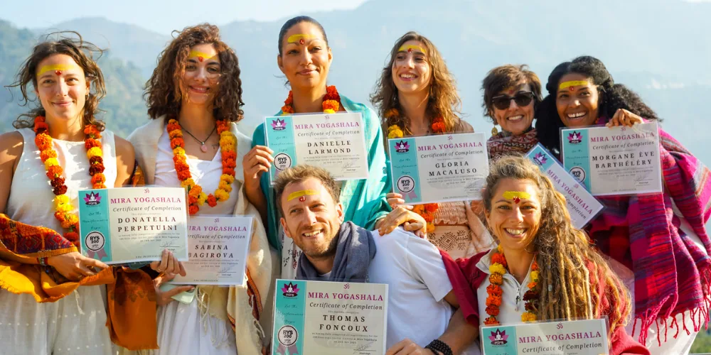 Mira Yogashala students together beside the Ganga in Rishikesh